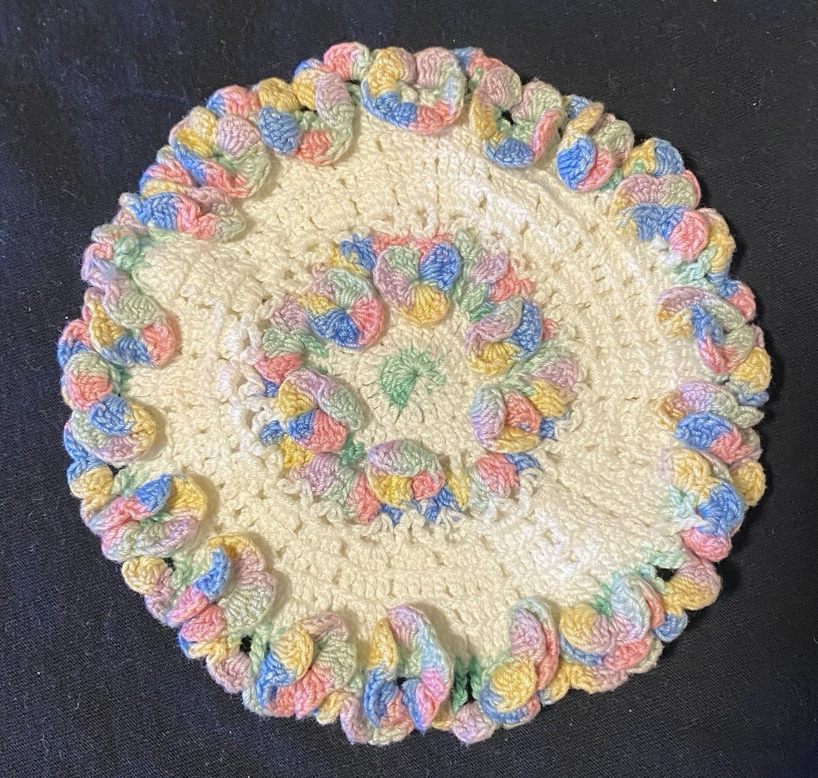 Hand Crocheted Round Vintage Trivet - Pink, Green, Blue & Yellow w/Frills gallery
