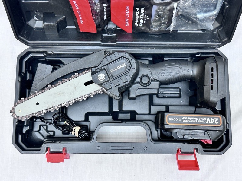O-CONN Mini Chainsaw 4 Inch Cordless Electric 2x 2000mAh Batteries & 2x Chains gallery