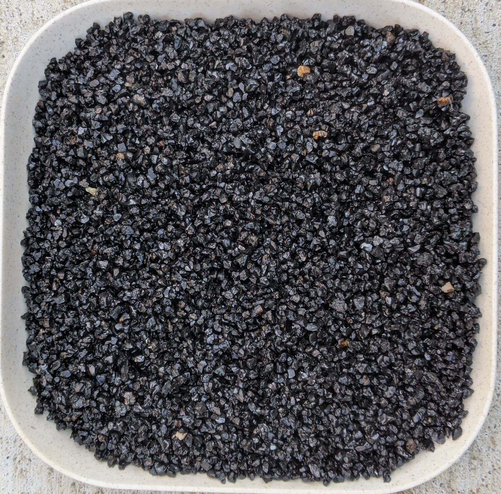 Natural shiny coarse black sand gallery
