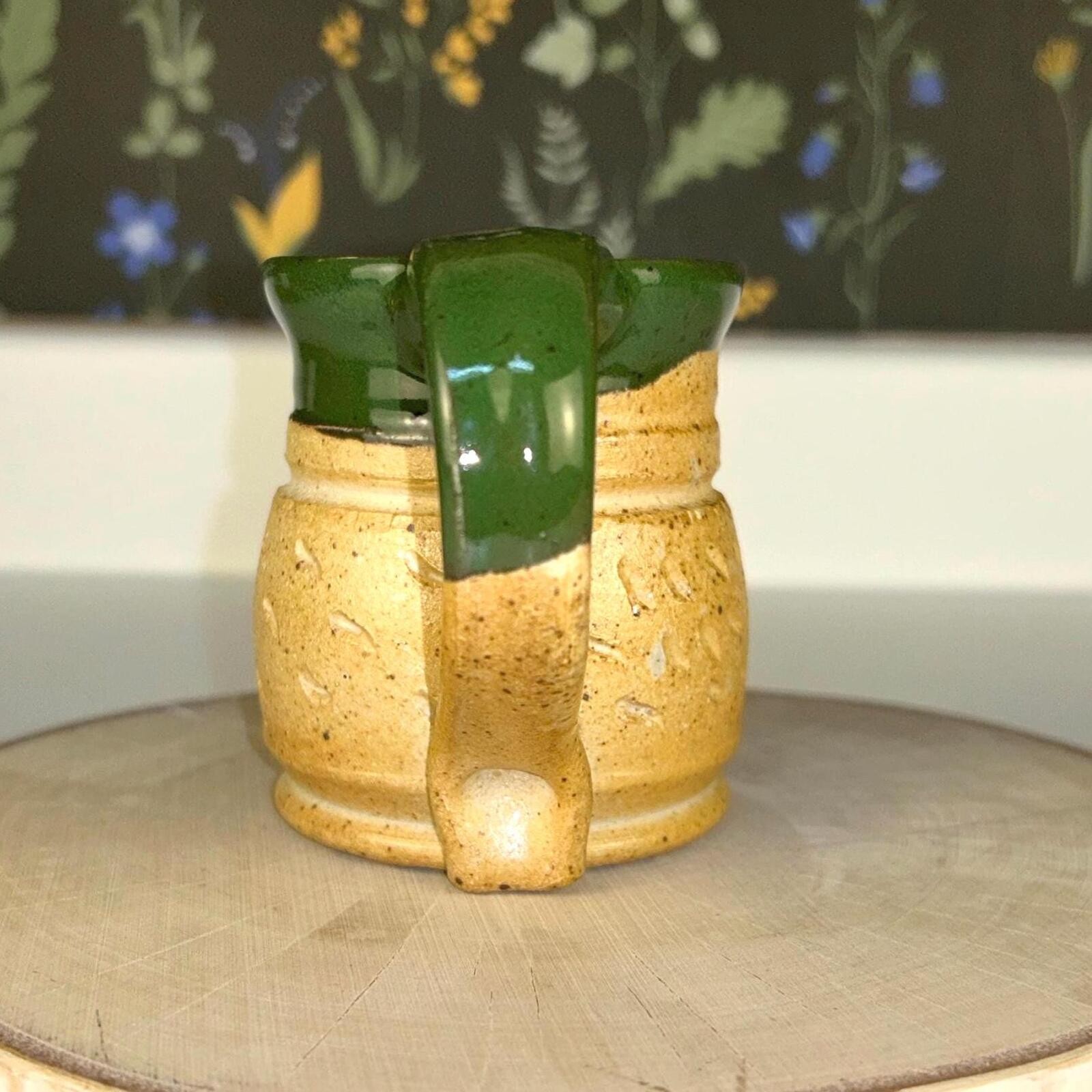 Rustic handmade studio pottery mug - etched tan with green speckled glaze gallery