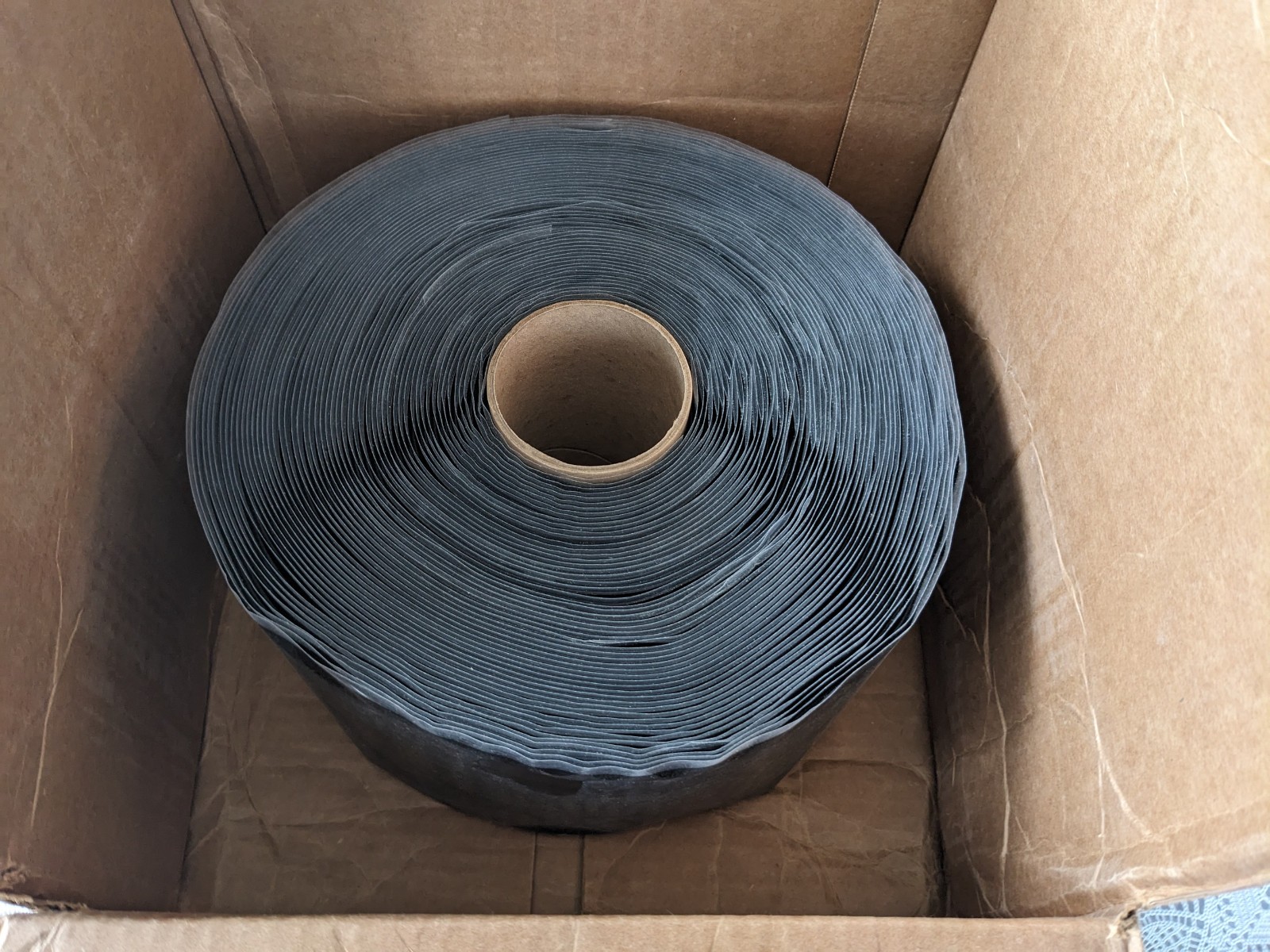 Anjon Manufacturing 6" x 100' Black EPDM Single Stick Flashing Tape - 302682.100 gallery