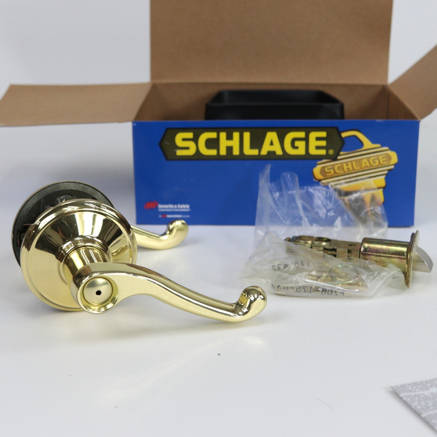 Schlage Flair Reversible Privacy Lock Lever Set in Polished Brass F40 FLA 605 gallery