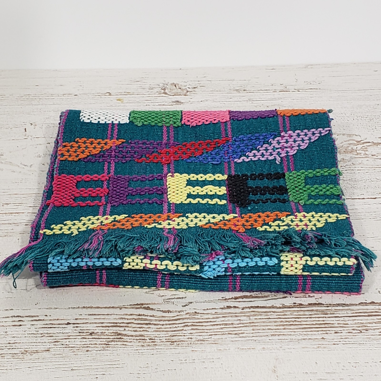 Handwoven Colorful Table Runner Teal background with lots of other primary color gallery