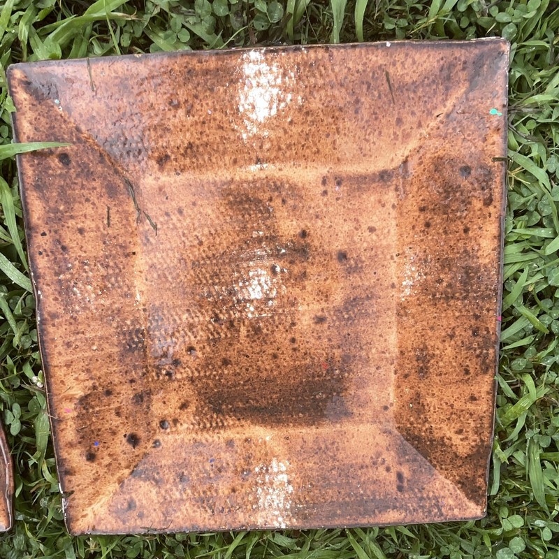 Table Under Plates For Dinner Table. Beautiful Brown Ceramic Dish ware gallery