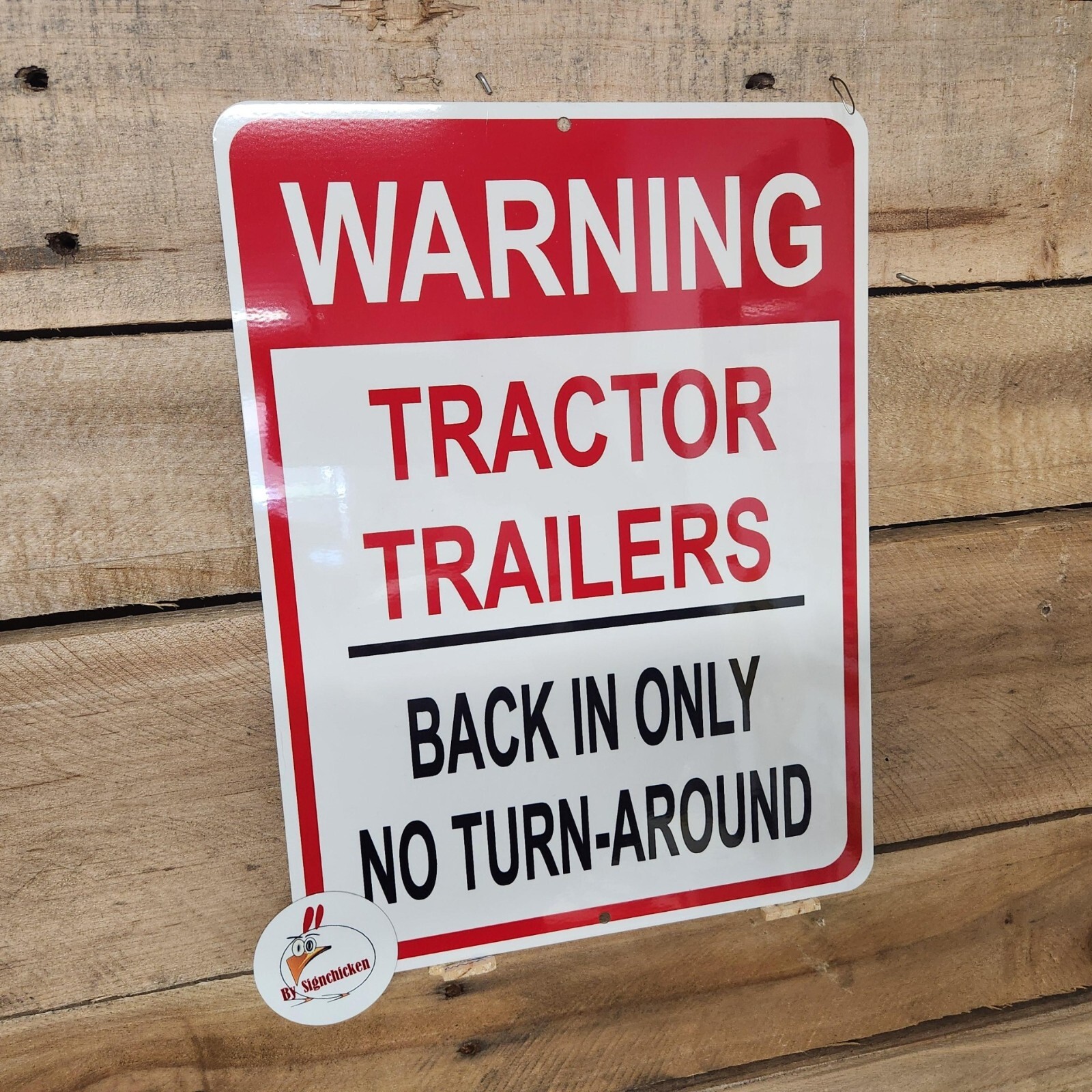 BACK IN ONLY, TRACTOR TRAILER, SIGN, road sign, loading dock, parking lot, drive gallery