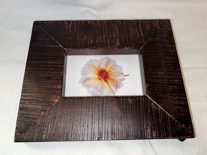 Rustic Wood frame with deep vertical grooves & finished in a dark, rich walnut gallery