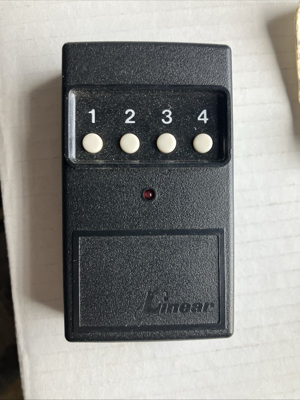 📳 OEM Linear DT-4 4 Button Remote Transmitter 310MHz 8 Dip Switch GuC Tested gallery