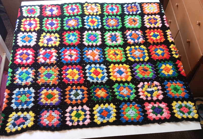 VTG Handmade Granny Square Afghan Blanket Crochet 47x62" Black Red Pink Blue gallery