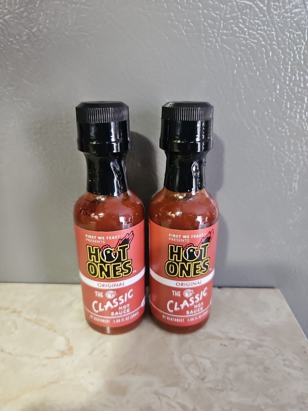 Qty 2 THE CLASSIC - Hot Ones - Original Mini 1.69 fl oz - CHILI DE ARBOL 8/2027 gallery