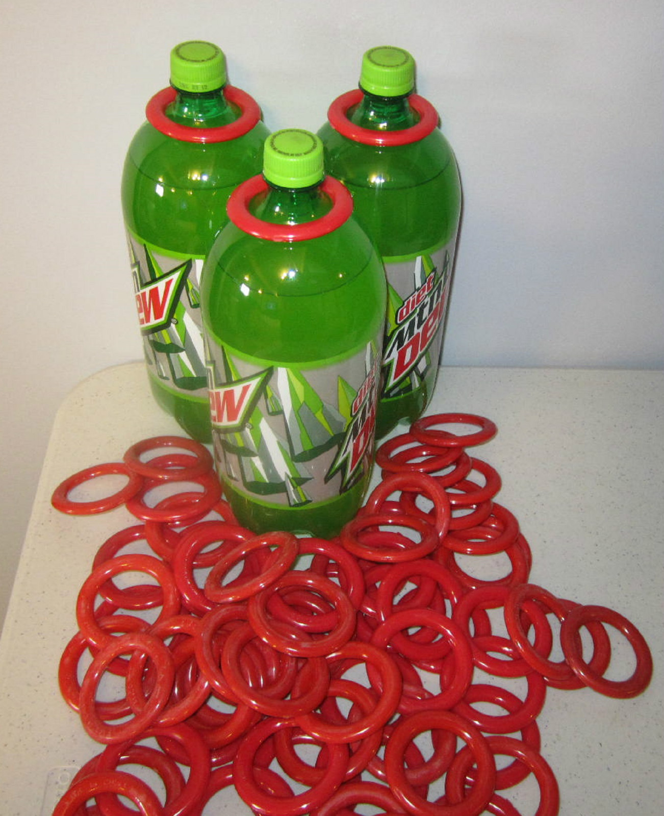 6 NEW CARNIVAL CANE RACK PLASTIC RINGS SODA BOTTLE TOSS RING SCHOOL PARTY gallery