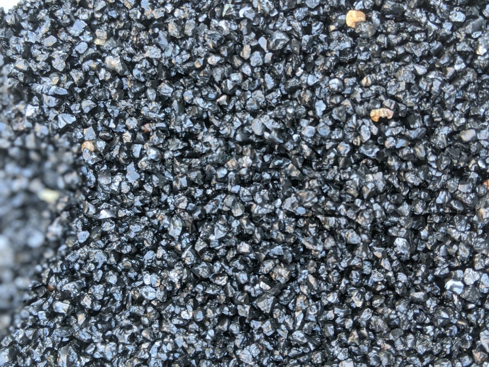 Natural shiny coarse black sand