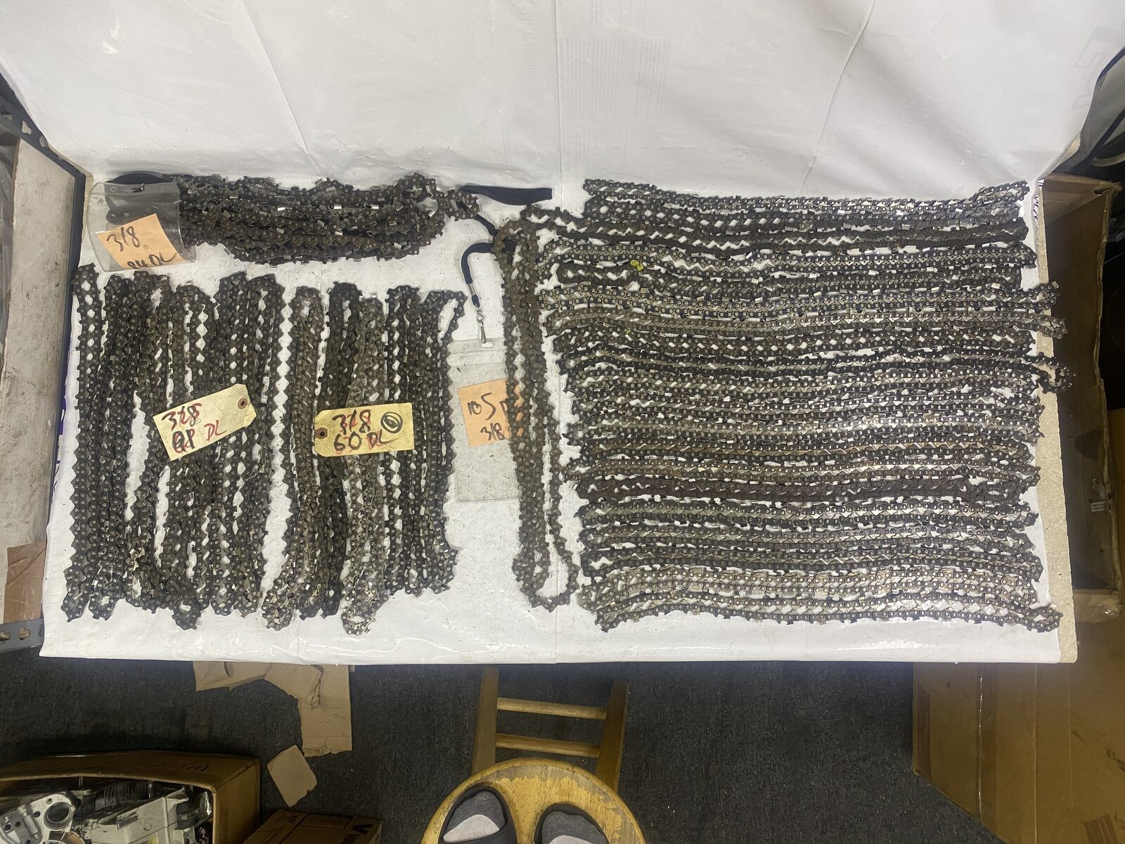 LOT OF 35 ASSORTED LENGTH CHAINSAW CHAINS WITH 3/8 PITCH - 25 POUNDS gallery