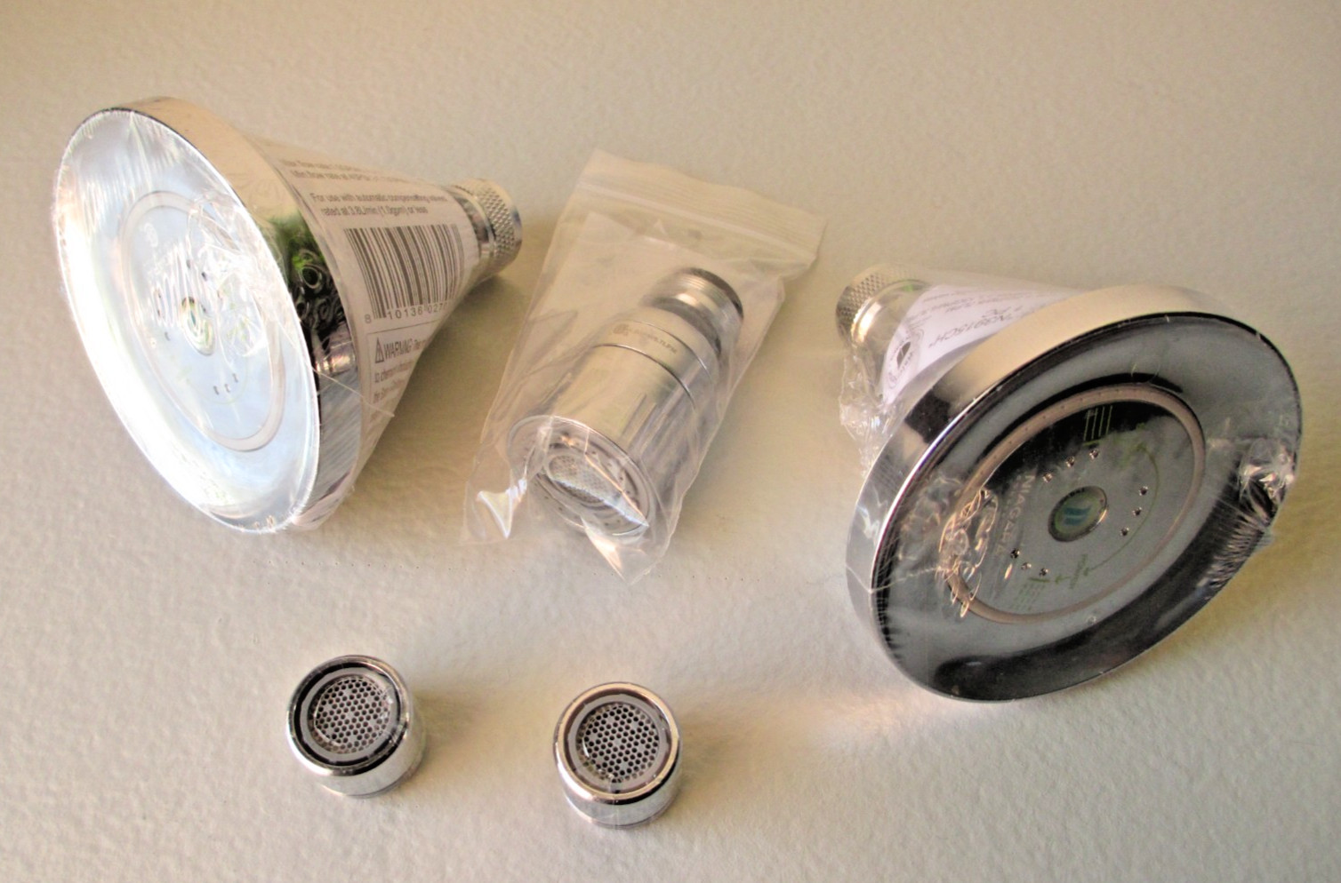 LOT : Niagara & Other Water Conservation Shower Heads & Sink Aerators (5 Items) gallery