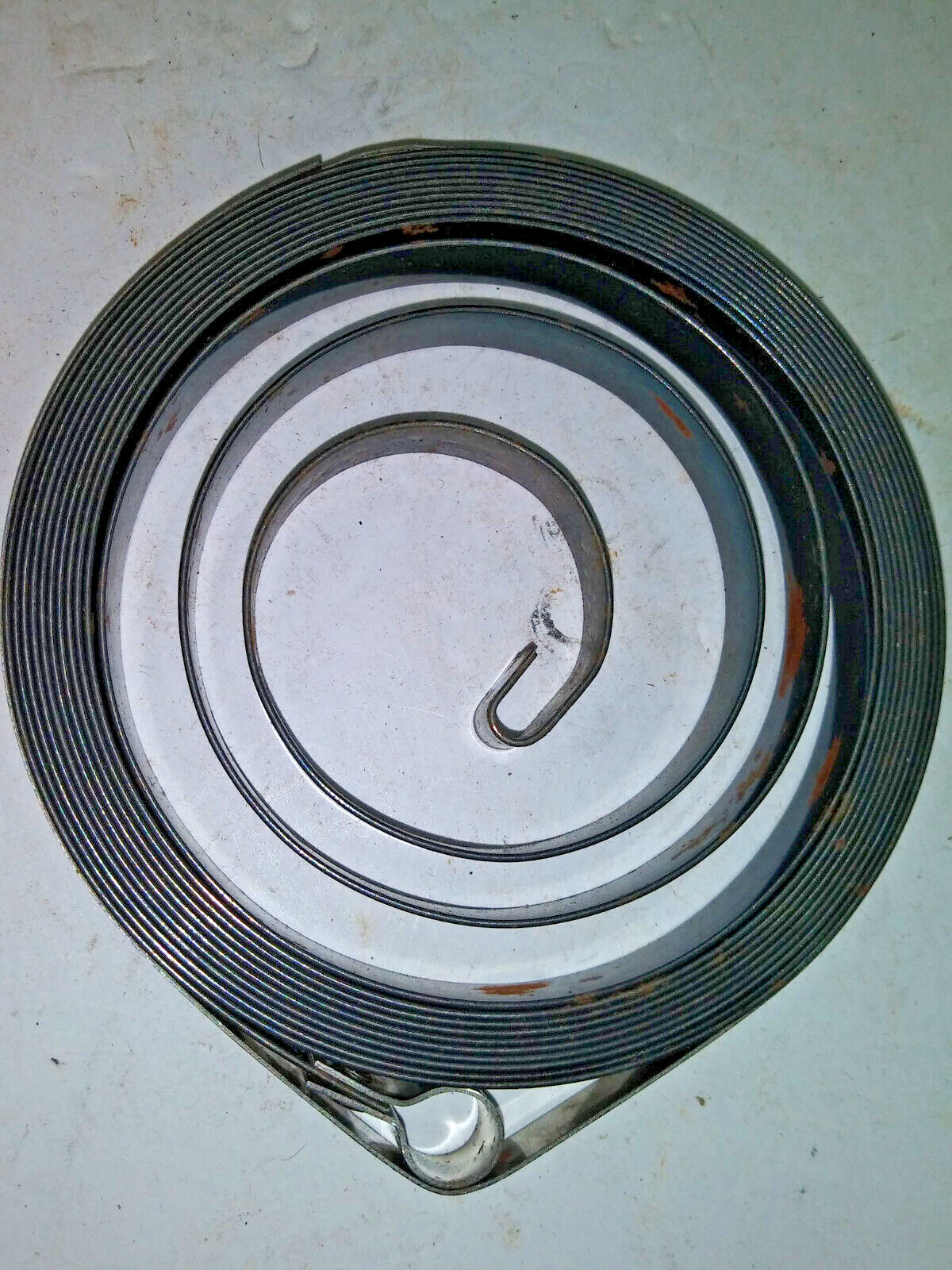 1 EACH, PIONEER NORTHWEST, CHAINSAW, PART# 178650, REWIND STARTER SPRING, 1 EACH gallery