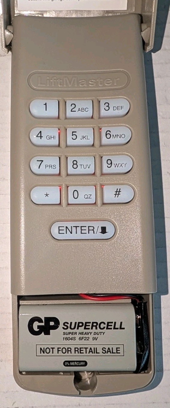 LiftMaster Wireless Keypad 878MAX 877MAX Garage Door Opener Missing Battery Cove gallery