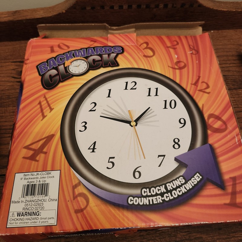 Funny Black Backwards Wall Clock (9") Large Numbers. Runs Counterclockwise gallery