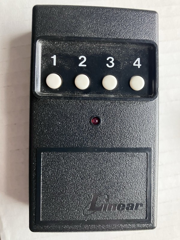 📳 OEM Linear DT-4 4 Button Remote Transmitter 310MHz 8 Dip Switch GuC Tested gallery