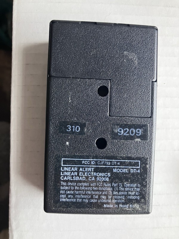 📳 OEM Linear DT-4 4 Button Remote Transmitter 310MHz 8 Dip Switch GuC Tested gallery