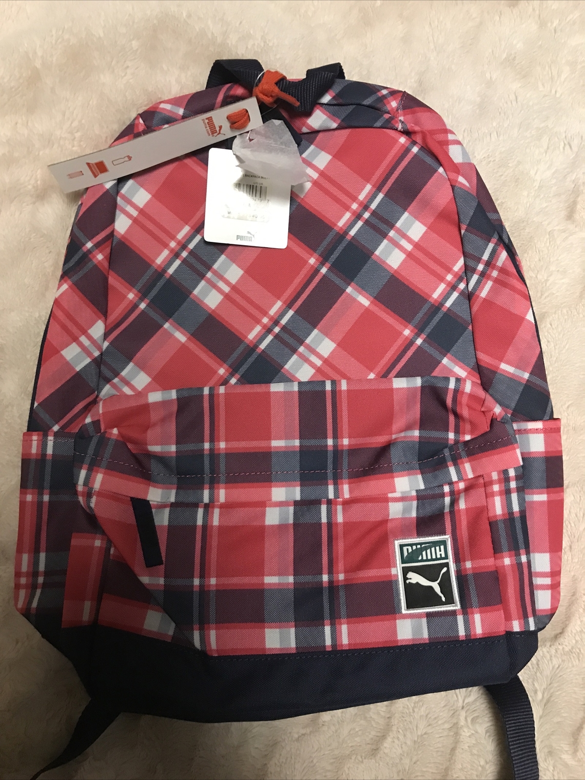 puma archetype plaid backpack pink and red