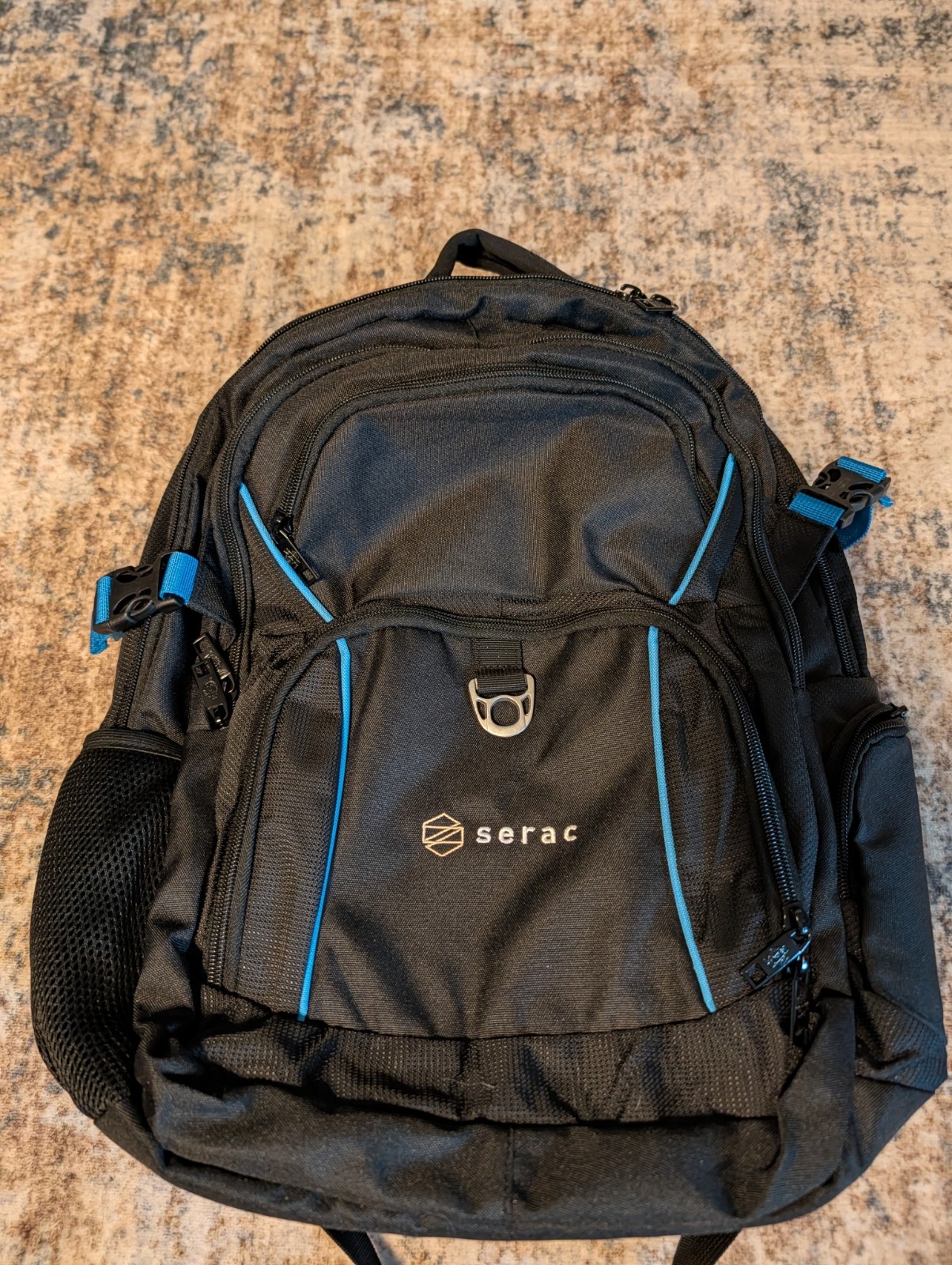Serac Black Blue Hiking Backpack Adjustable Straps 5 Pockets Mesh Compartments