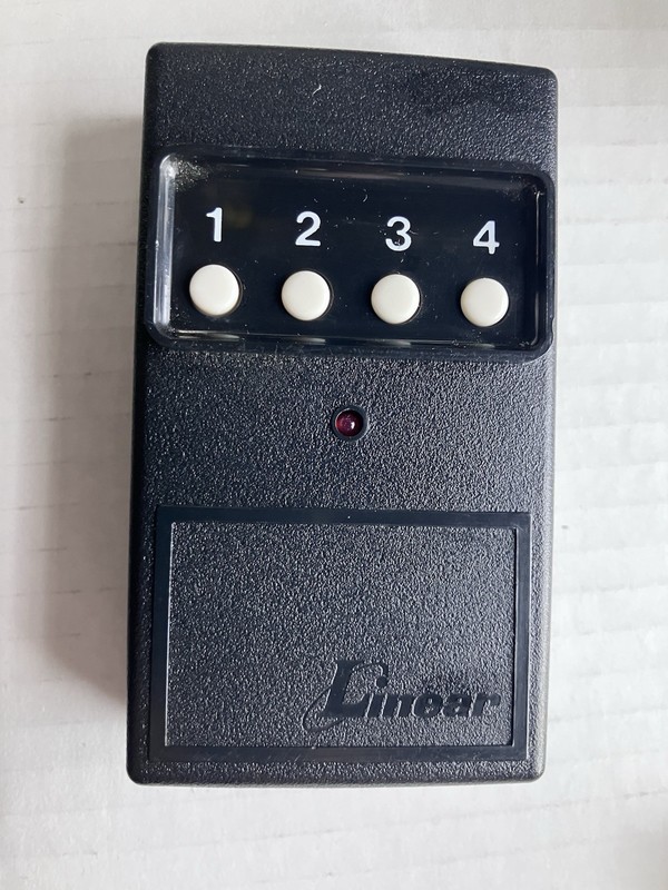 📳 OEM Linear DT-4 4 Button Remote Transmitter 310MHz 8 Dip Switch GuC Tested gallery