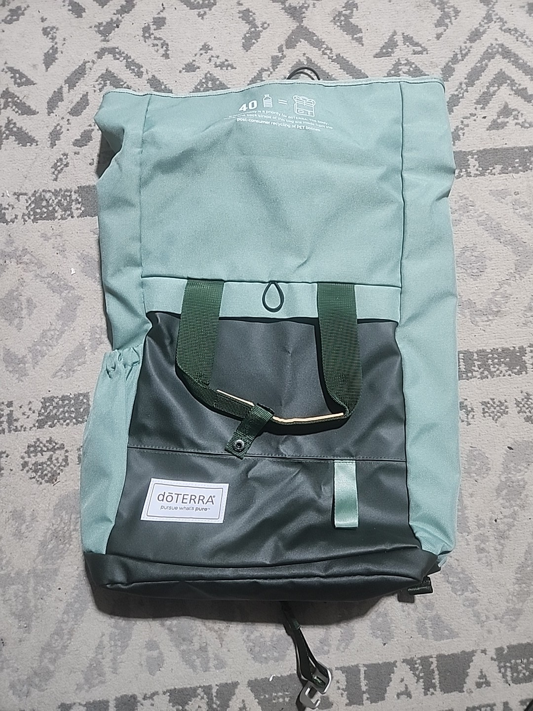 doterra backpack with multiple pockets, padded straps and adjustable waist strap