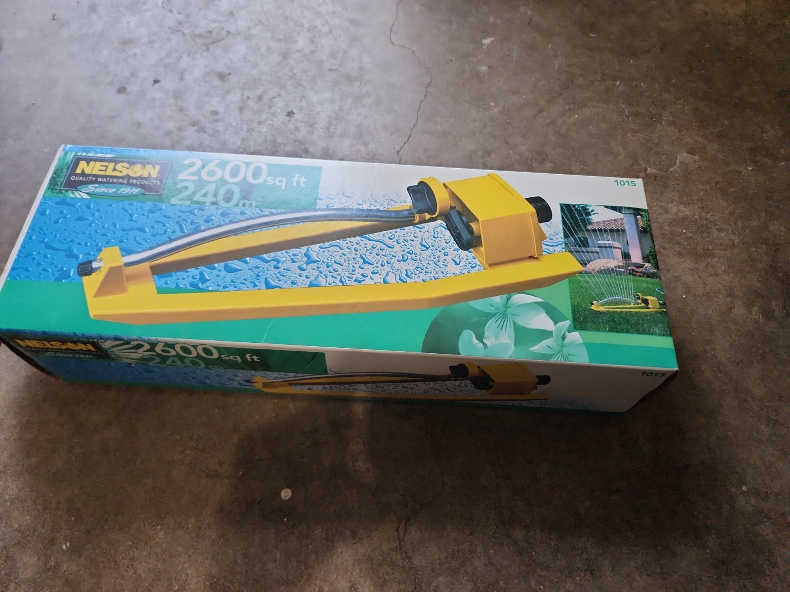 2000's Vintage Nelson Oscillating Metal Sprinkler Yellow Model 1015 2600 sqft gallery