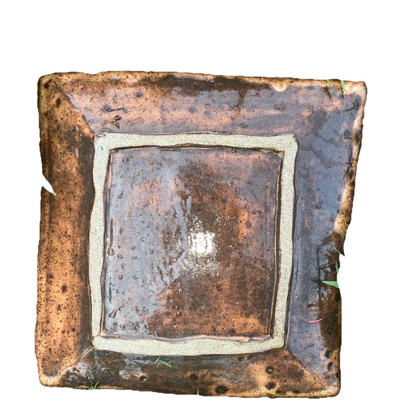 Table Under Plates For Dinner Table. Beautiful Brown Ceramic Dish ware gallery