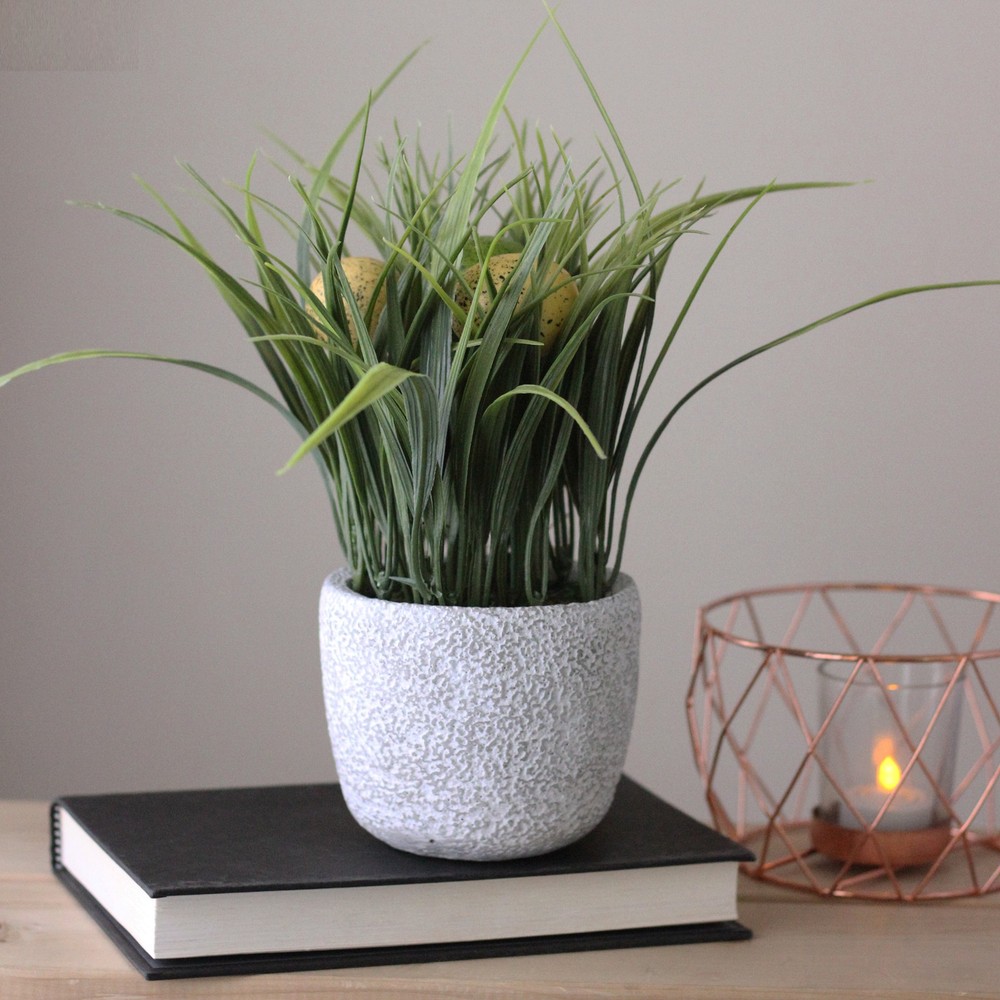 Northlight 10" Artificial Spring Time Easter Grass and Egg Floral Arrangement