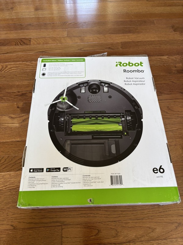 Roomba E6198 with 2 additional wall barrier and Charging Base, need a battery. gallery