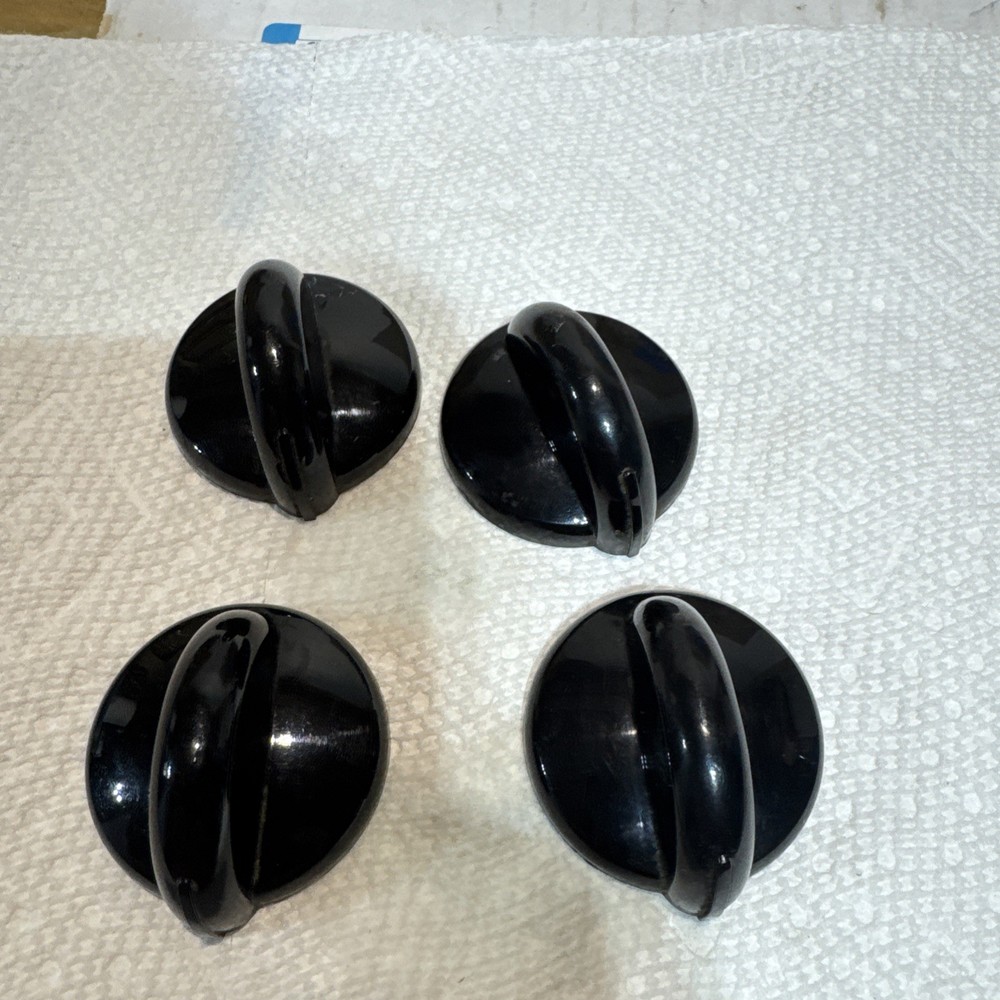 4 GE Electric Knobs Model #JBP68MOK1BS Black (Storage 4)