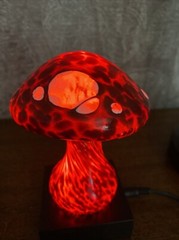 Stuart Abelman Signed hand blown red mushroom with white inclusions