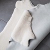 Genuine Lambskin Ivory, approximately 32" dia gallery
