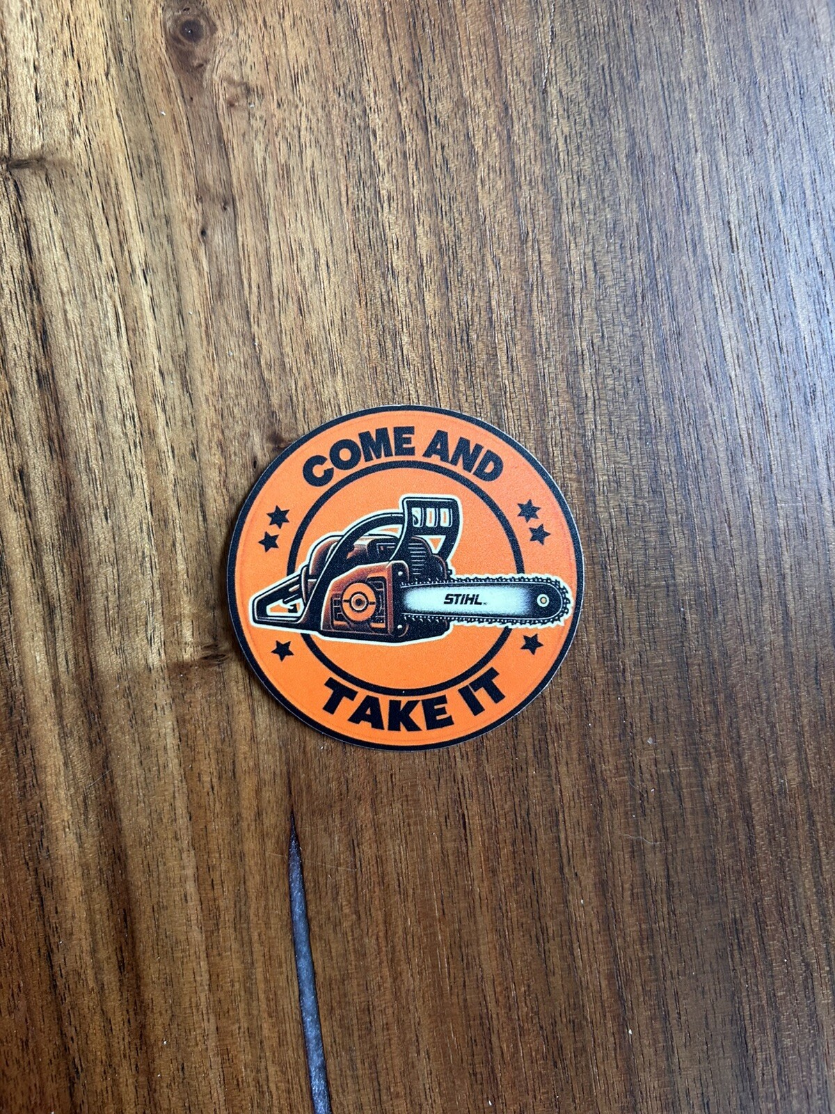 Stihl Chainsaw Sticker, “Come And Take It” 2 1/2 Inch. gallery