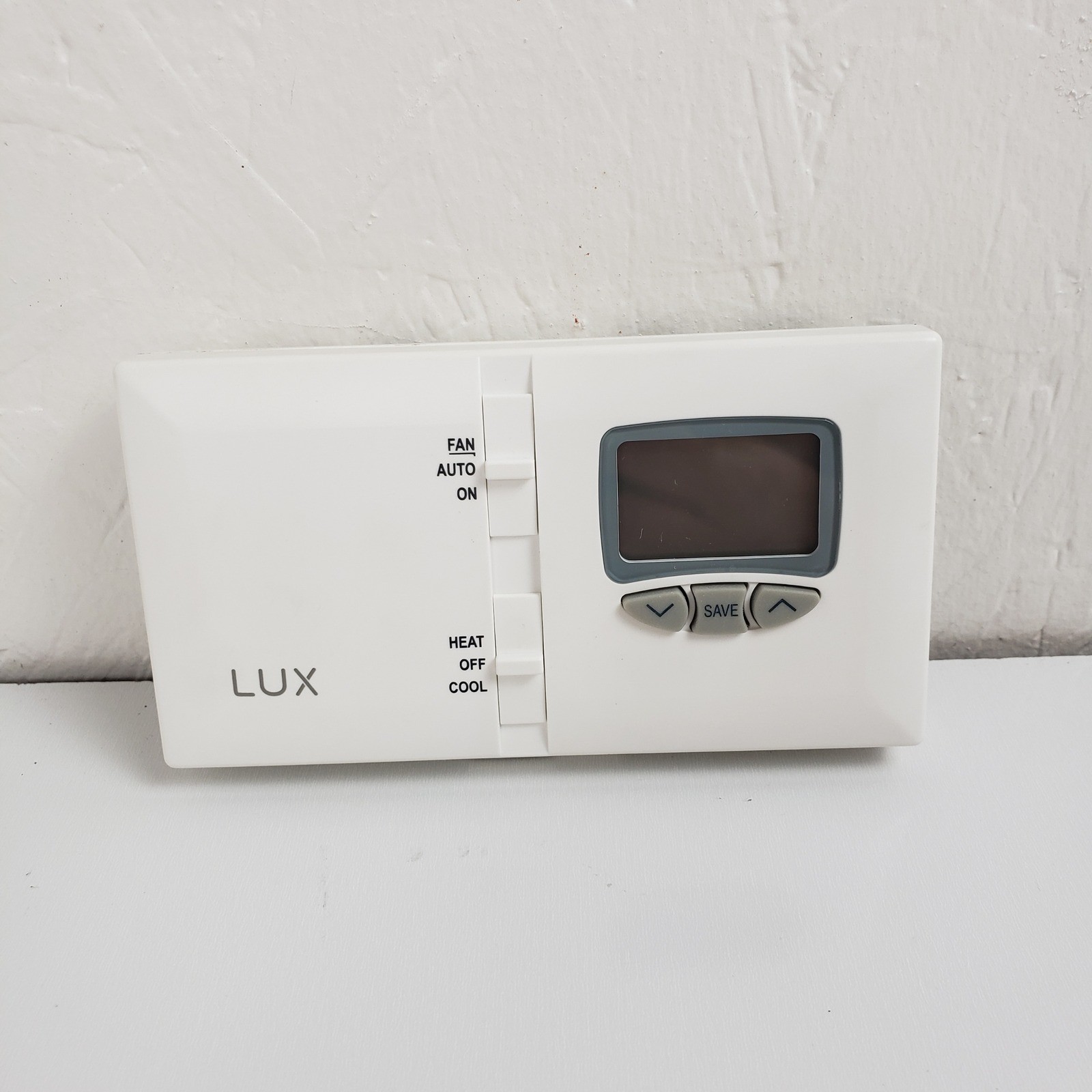 LUX DMH110 Non-Programmable Thermostat White Heat Cool Fan Low Voltage 170124D gallery