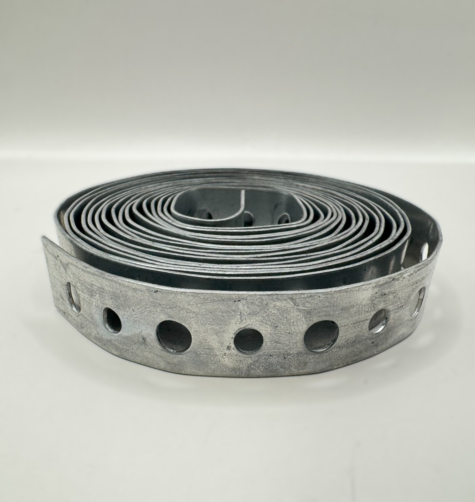 Galvanized Plumbers Tape – Perforated Metal Hanger Strap–3/4"x10 feet (28 Guage) gallery