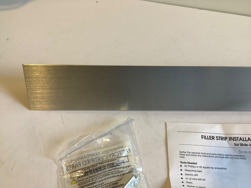Whirlpool W10113901A Triangular Filler Strip Stainless Steel Trim OEM gallery