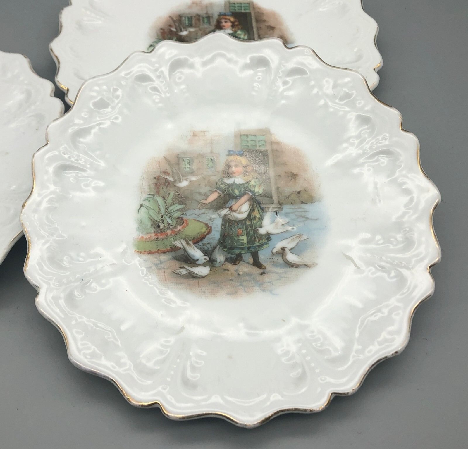 Antique Germany Porcelain Child's Doll Plate Girl Feeding Birds x3 gallery