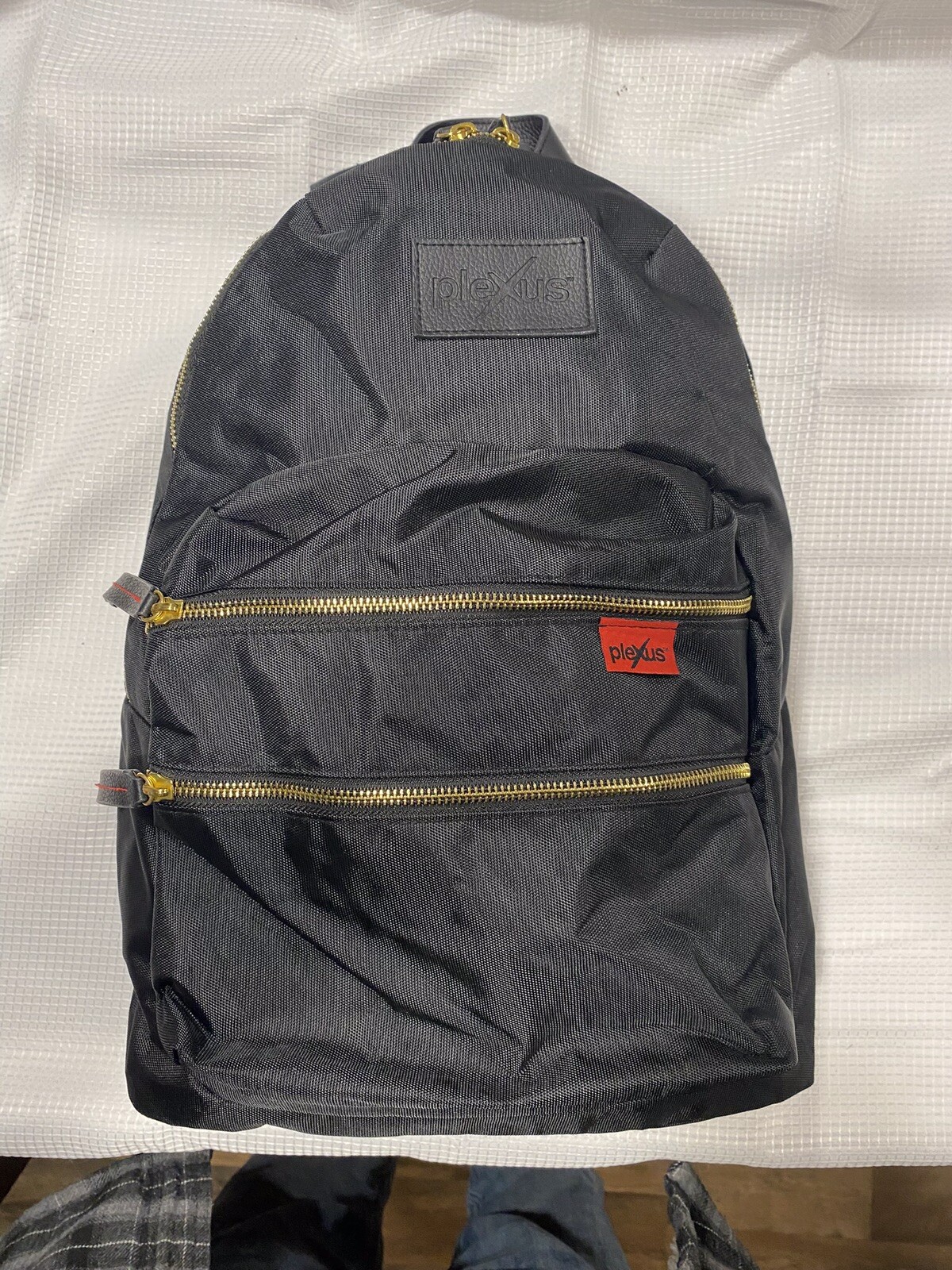 Plexus Brand Backpack, Black W/Gold Hardware.