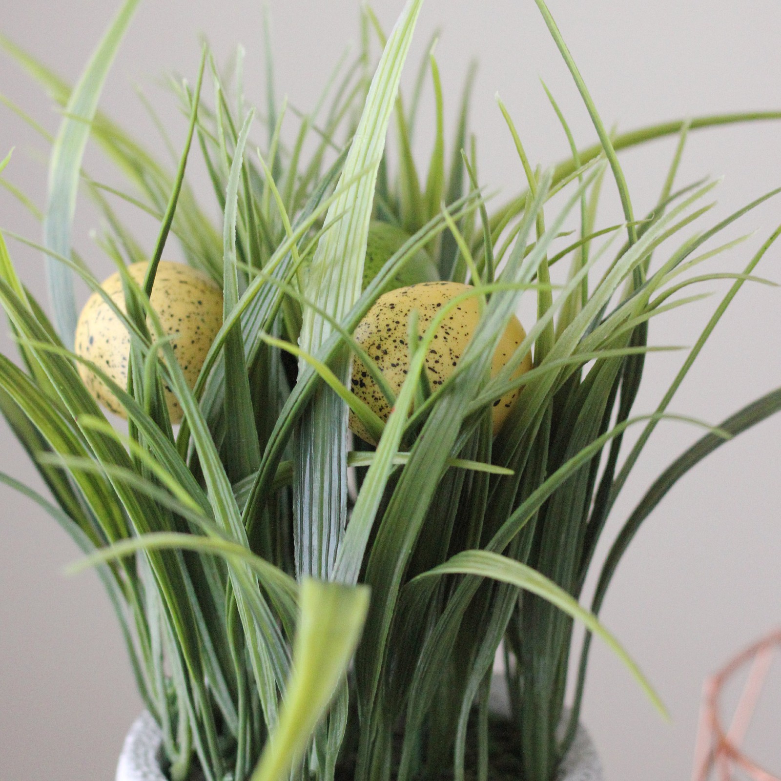 Northlight 10" Artificial Spring Time Easter Grass and Egg Floral Arrangement gallery