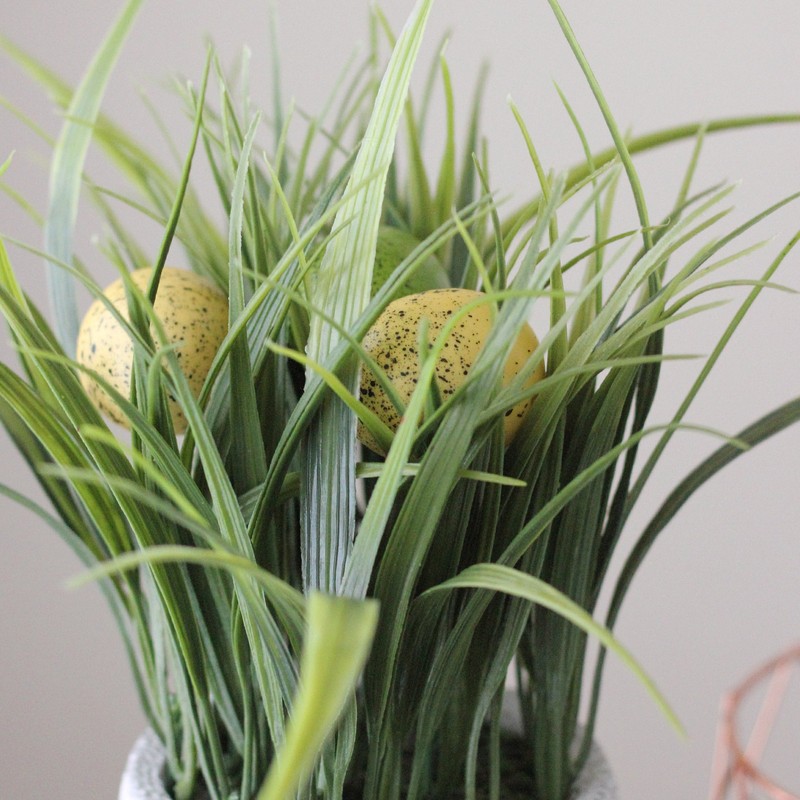 Northlight 10" Artificial Spring Time Easter Grass and Egg Floral Arrangement gallery