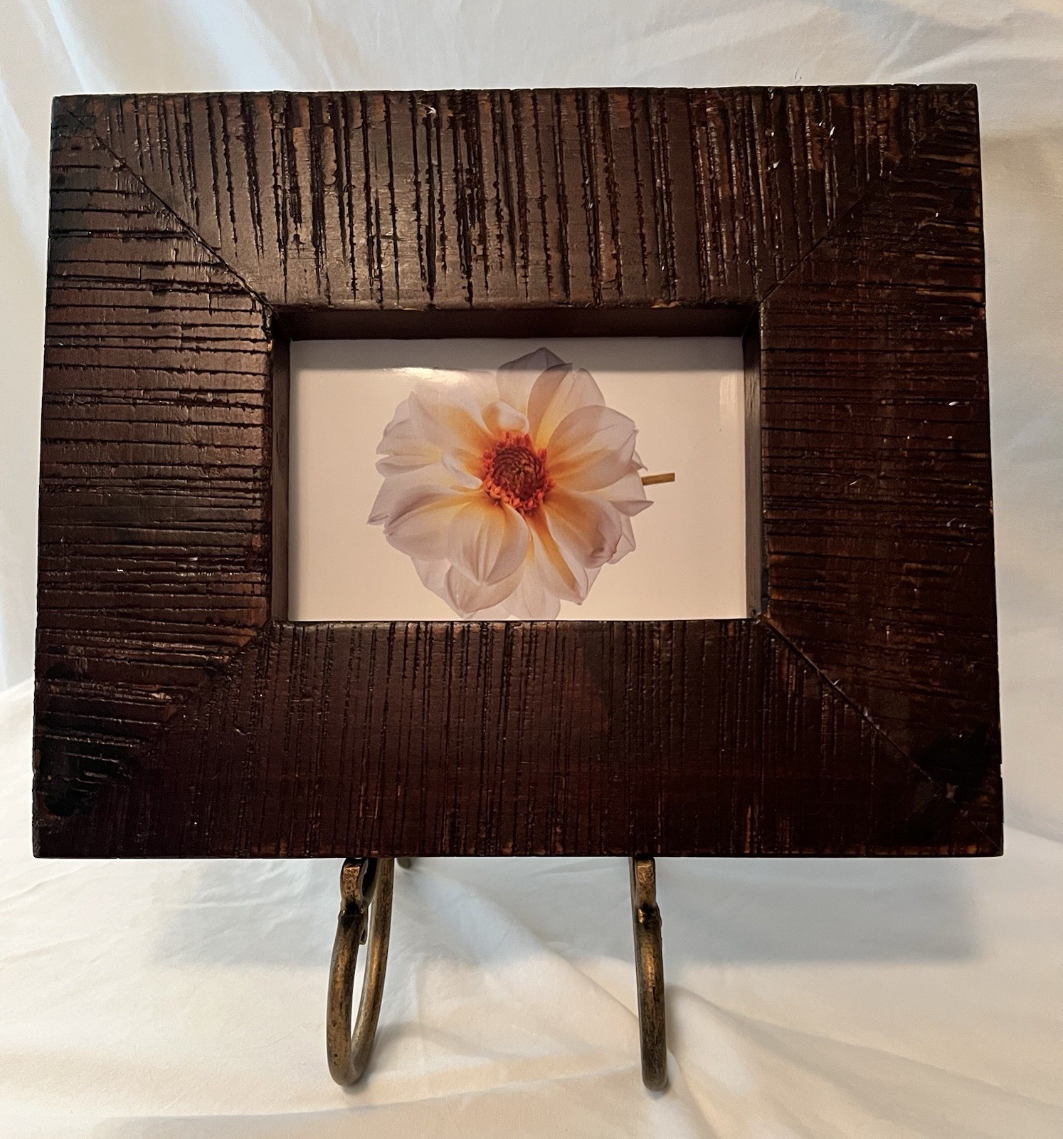 Rustic Wood frame with deep vertical grooves & finished in a dark, rich walnut gallery