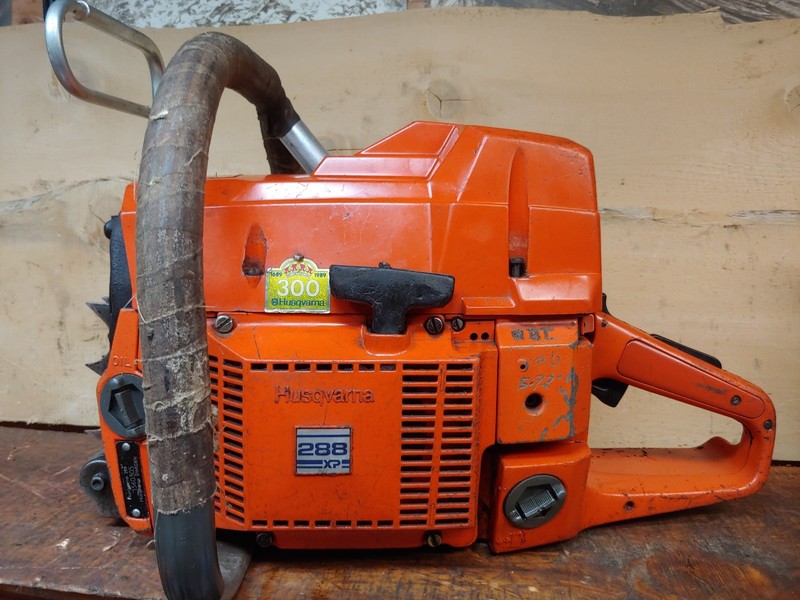 NICE HUSQVARNA 288 XP WRAP HANDLE HIGH TOP OEM NEW CHAINBRAKE *CRACK IN CASE gallery