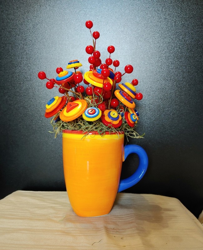 Bright Button Bouquet in Orange Coffee Mug. Red, orange, yellow. fun and playful gallery