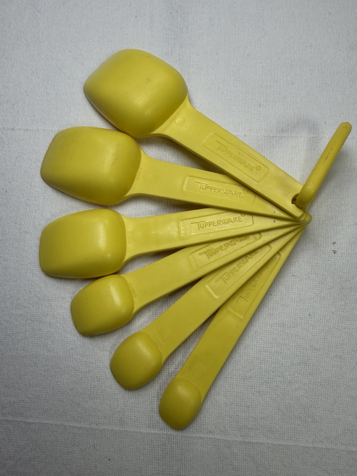 Vintage Tupperware 6pc Yellow Measuring Spoons Set, Nesting, Marked 1 tbsp-1/8 gallery