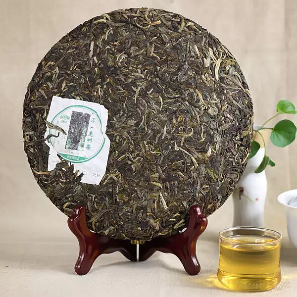 Haiwan High Mountain Ancient Tree 2014 Old Comrade Raw Puer Tea 500g Batch 141 gallery