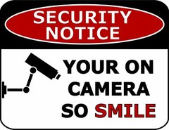 Security Notice Your on Camera So Smile 11.5 inches x 9 inches Laminated Sign