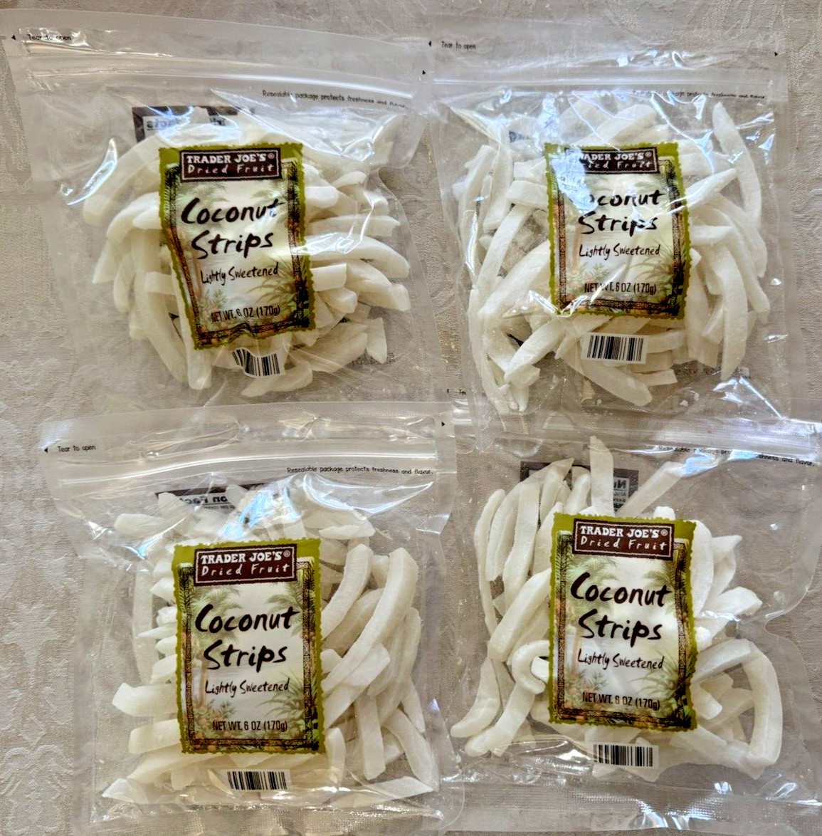 4 Packs Trader Joe's Dried Fruit Coconut Strips Lightly Sweetened 6 oz Each Pack gallery