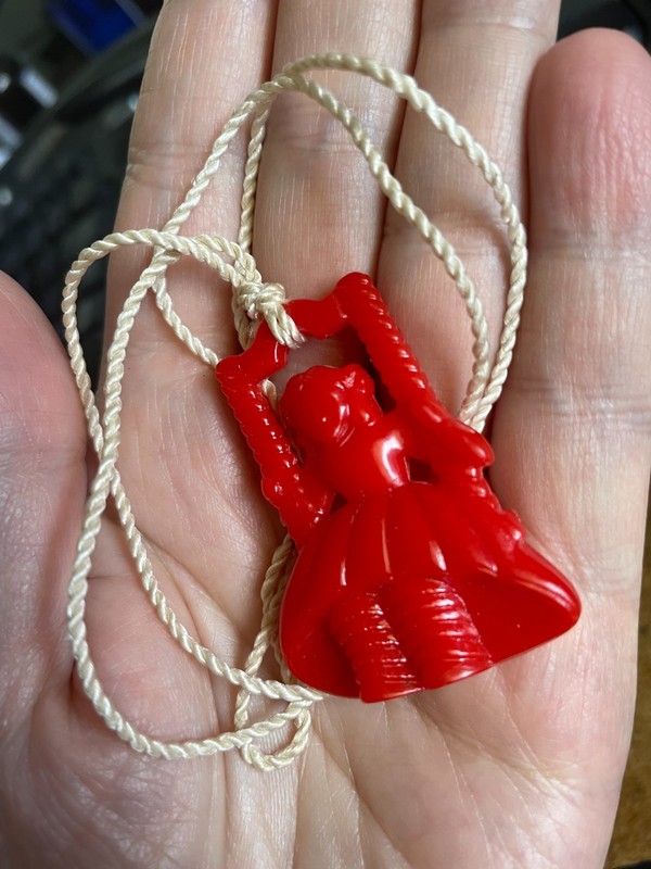 WINDOW SHADE or LIGHT CHAIN PULL, Dutch Girl on Swing Vintage 1950s Red Plastic gallery