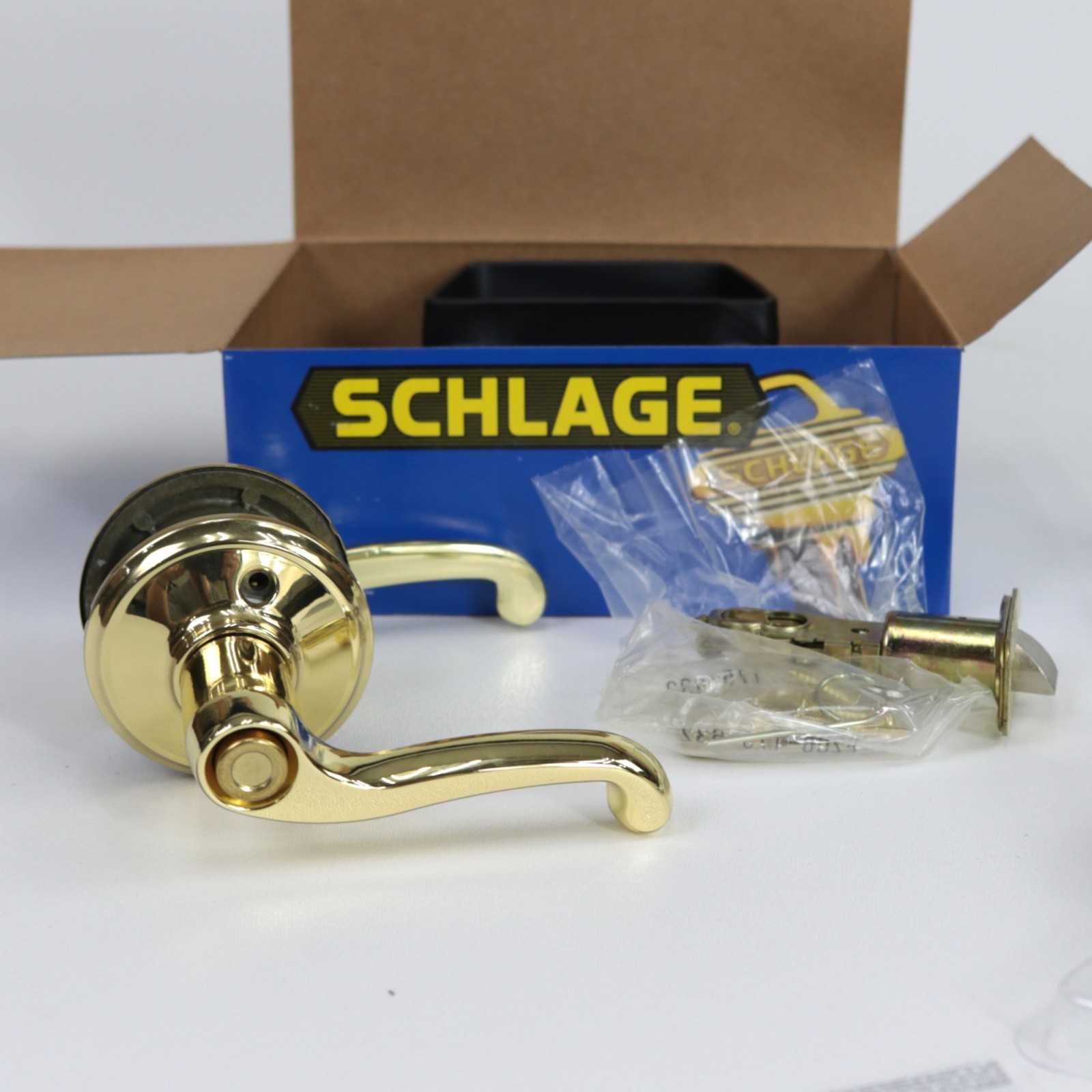 Schlage Flair Reversible Privacy Lock Lever Set in Polished Brass F40 FLA 605 gallery